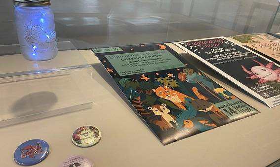 Humanities Symposium posters in an exhibition case
